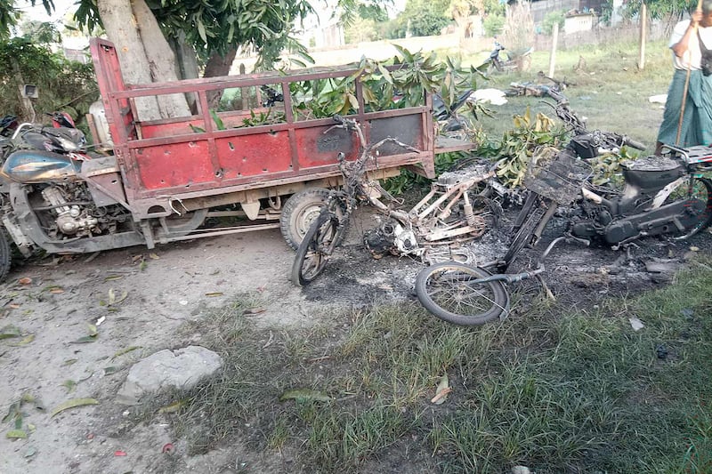 This image courtesy of Yebaw Hlyat Cee taken on October 7, 2025 shows damage to vehicles next to the site of a military strike in central Myanmar's Chaung U township.