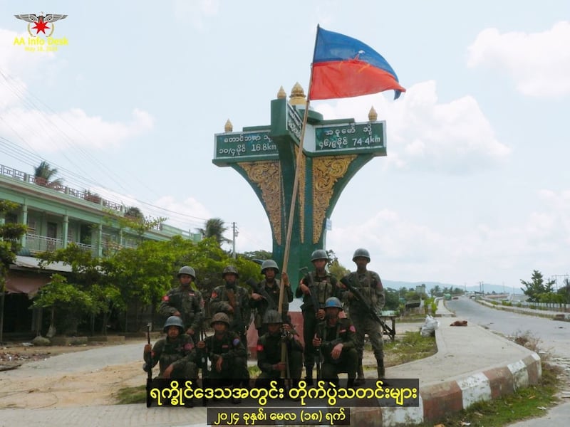Arakan Army troops pose in Buthidaung, Myanmar, in an image posted to social media May 18, 2024. (AA Info Desk via VKontakte)